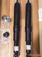 GM genuine OEM part 72119085 Shock absorber, assembly, with mounting parts